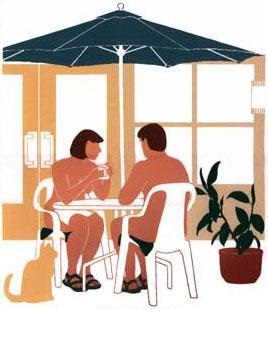 couple sipping coffee under umbrella at outdoor table