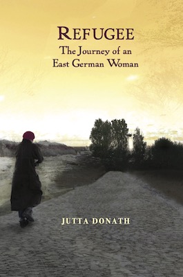 Cover image of a woman standing on a road